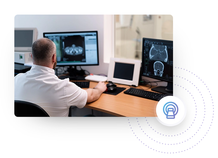 Teleradiologist Reading X-rays on a Screen